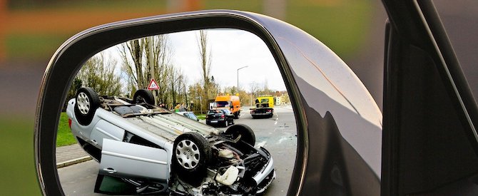 Crashed car in mirror