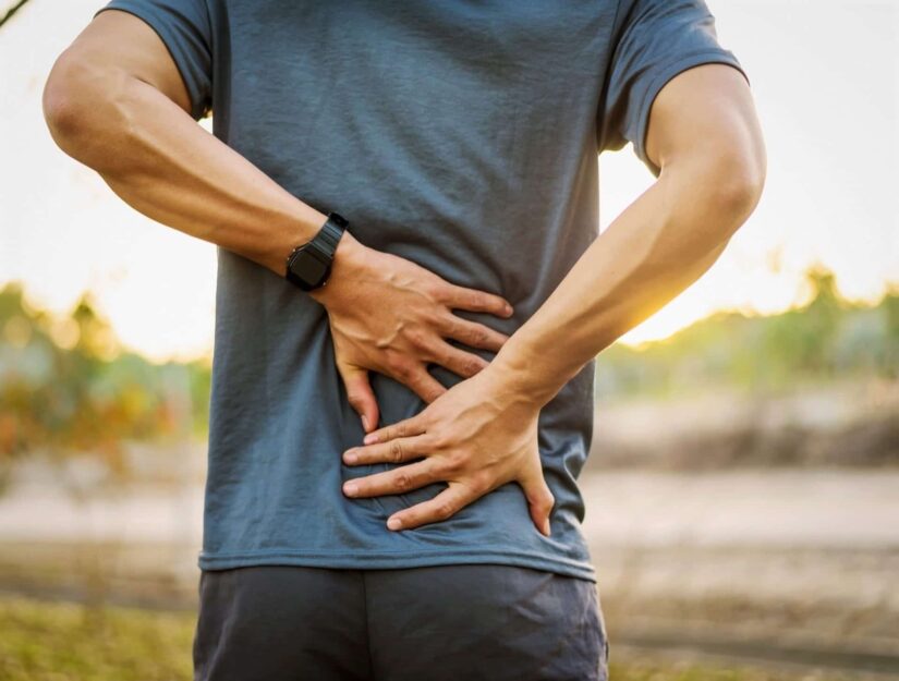 photo of person having back pain