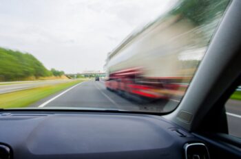 A speeding truck on a Florida highway. Call a Tallahassee truck accident lawyer today.